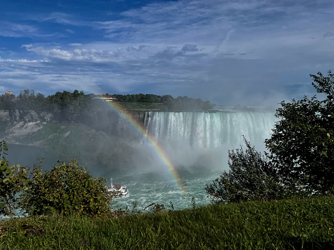 Niagara Falls with a rainbow in the sky. Ontario, Canada.