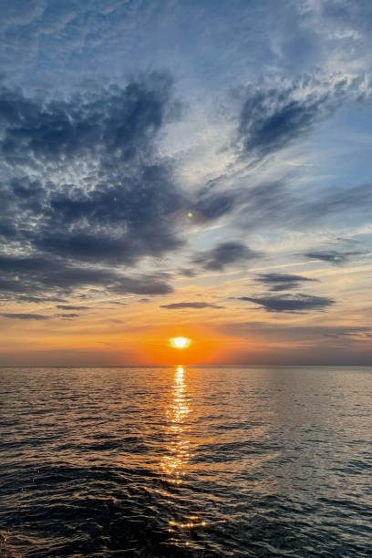 istock Sunset over the lake on a summer day. 2082521917