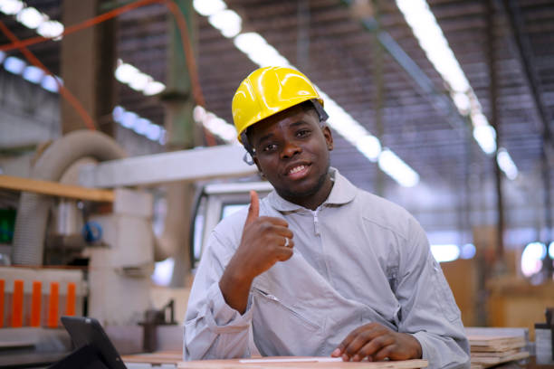 Emotional man in orange paint construction industry work lifestyle. High quality photo