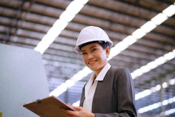 istock Blue collar worker is working at wood factory. 2082623366