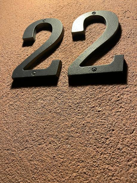 istock Number 22 attached to a wall. 2082647939