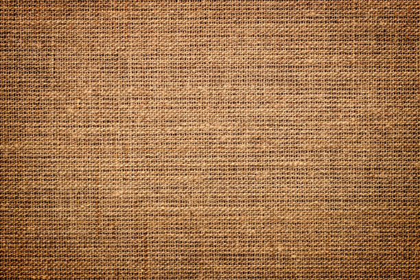 istock coarse fiber fabric texture, linen sackcloth background 2082667137