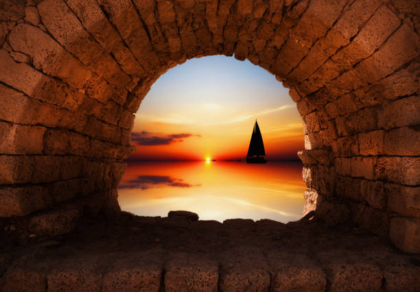 istock Yacht sailing against sunset 2082711018