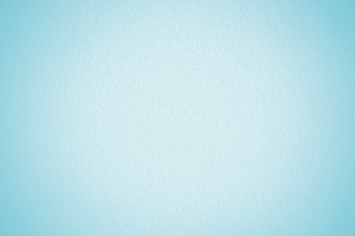 Light blue concrete cement wall texture for background and design.