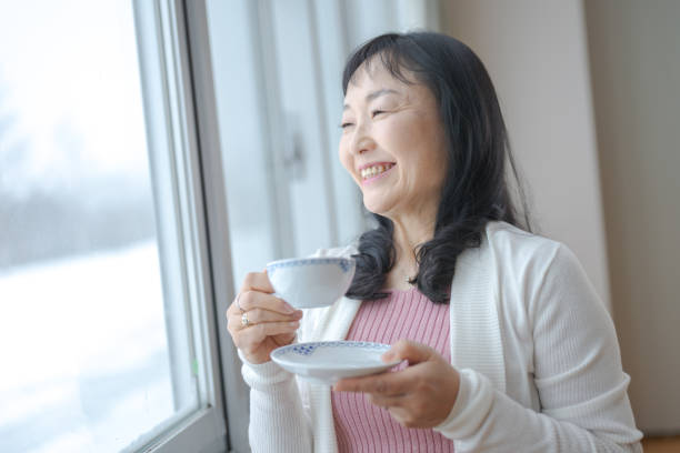 istock cafe time woman 2082758336