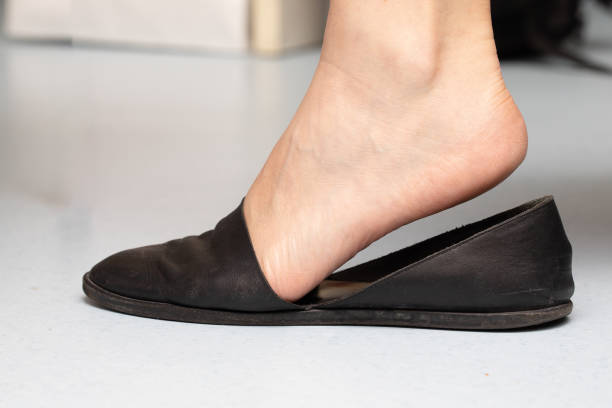 istock Casual Black Ballet Flat on Bare Foot 2082764684
