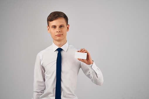 man in shirt with tie office business card advertisement. High quality photo