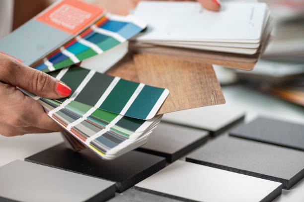 istock An interior designer choosing color samples, including compact boards, for a harmonious color palette 2082826696
