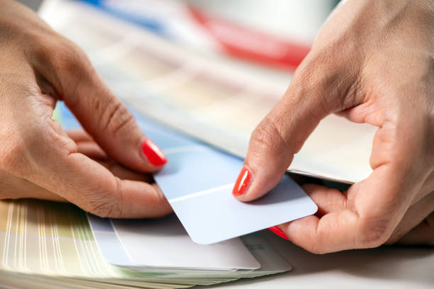 istock An interior designer carefully chooses compact board samples and colors from a palette for a project's design 2082827732