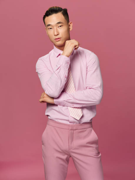 istock man asian appearance pink shirt pants elegant style isolated background 2082832933