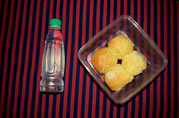 Mineral water and chocolate bun bread in PET products.