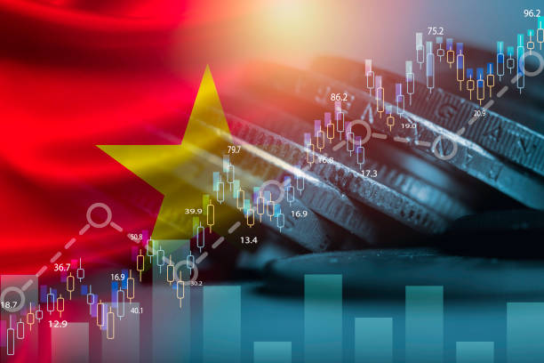 Double exposure among of coins stacking , stock market graph chat and Vietnam flag for Vietnam country is new born economy and high business development growth from many investment concept. la doble exposición entre el apilamiento de monedas, el chat del gráfico del mercado de valores y la bandera de vietnam para el país de vietnam es una economía recién nacida y un alto crecimiento del desarrollo empresarial de muchos conceptos de inver