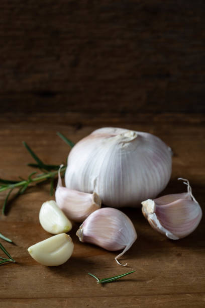 istock garlic on wooden background 2082902669