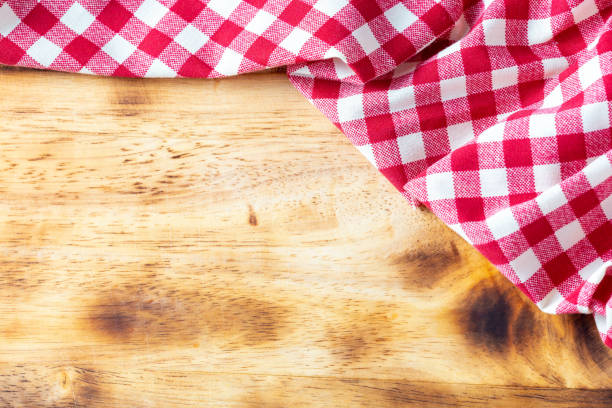 istock red table cloth on wooden background 2082903187