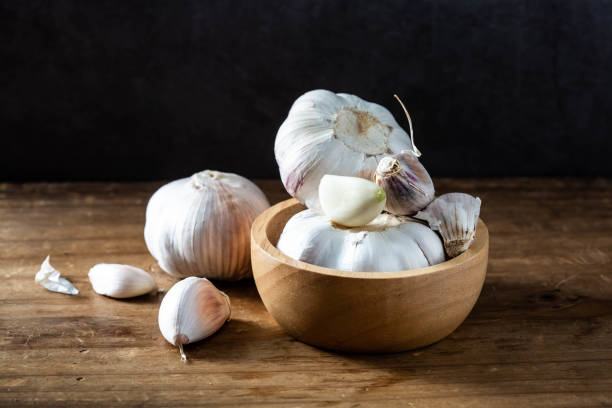 istock garlic on wooden background 2082903711