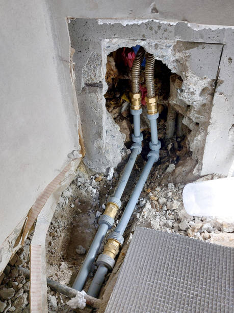 istock Construction to replace rusty water pipes in a house 2082934899