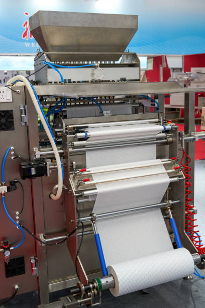 istock Packaging machine assembly line equipment in food factory 2082945471