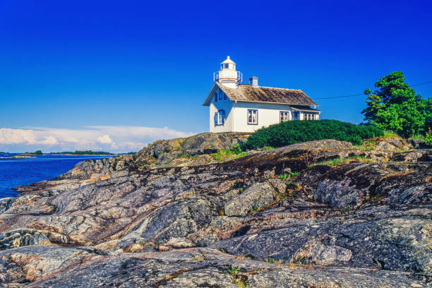 istock Lighthouse on a cliff in a beautiful archipelago 2082948205