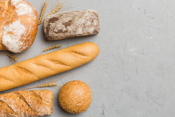 istock Homemade natural breads. Different kinds of fresh bread as background, top view with copy space 2082962809