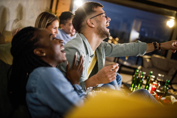 istock Watching funny movie at home! 2083001951