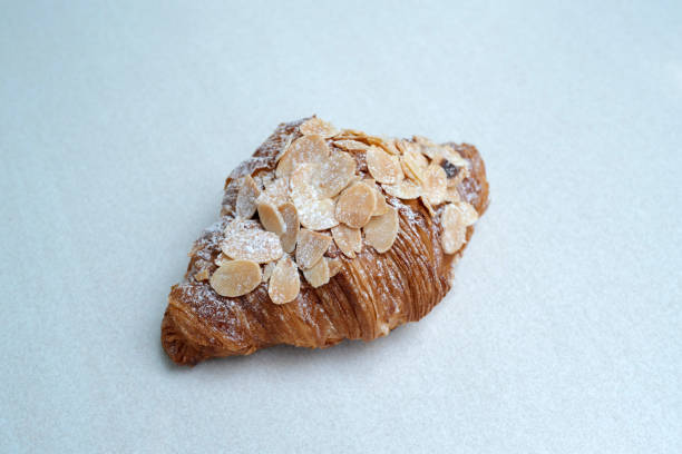 istock Close up Almond croissant on white table 2083010505