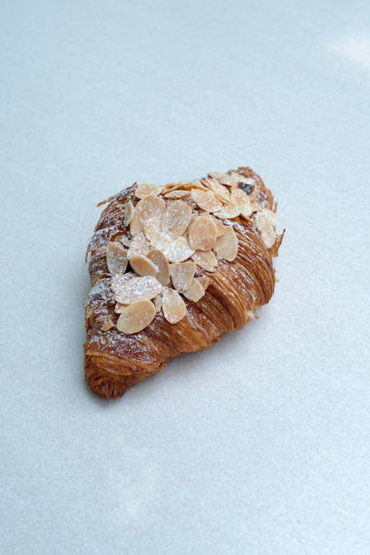 istock Close up Almond croissant on white table 2083010538