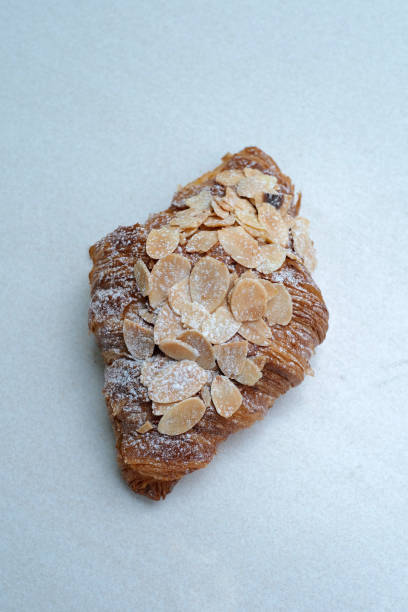 istock Close up Almond croissant on white table 2083010539