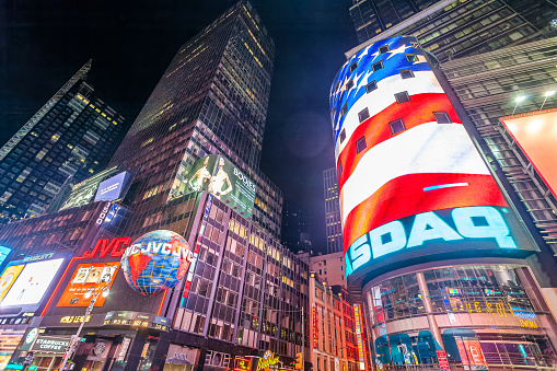 The American flag displayed on the Nasdaq ad screen, Times Square, NYC, USA