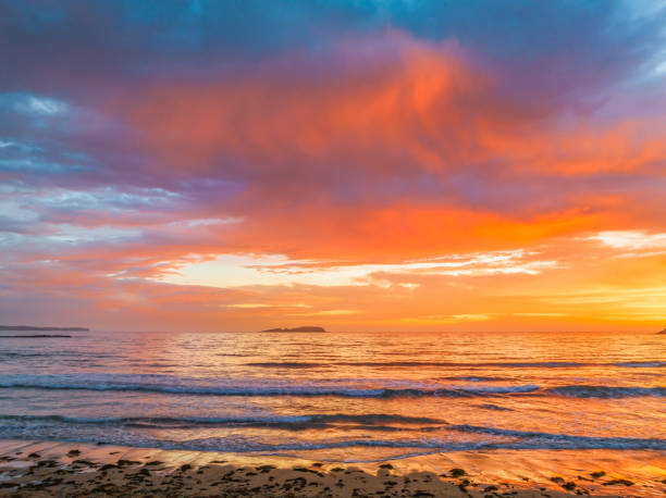 istock Summer Sunrise Seascape with Rain Clouds 2083108932