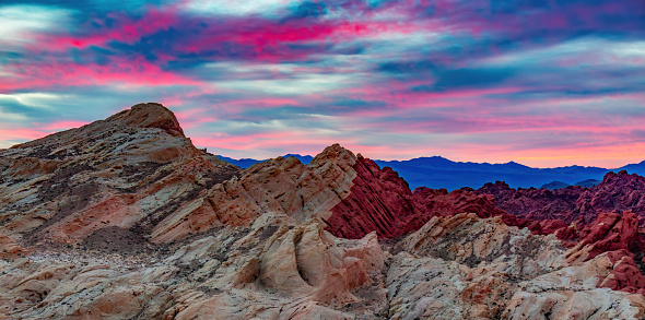 Dramatic Sunrise over rocky landscape terrain. Valley of Fire, Nevada, United States.