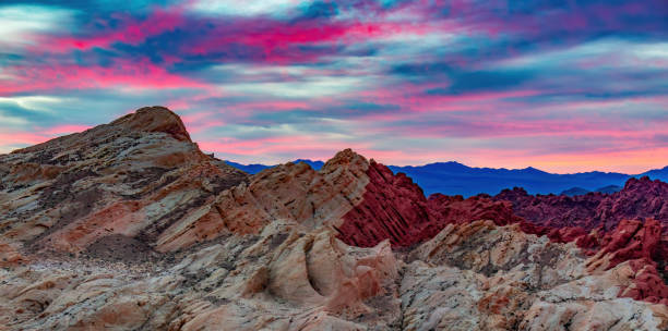 Dramatic Sunrise over rocky landscape terrain. Valley of Fire, N Dramatic Sunrise over rocky landscape terrain. Valley of Fire, Nevada, United States. nevada landscape stock pictures, royalty-free photos & images