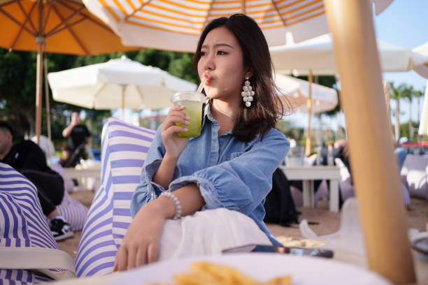 young woman drinking drink