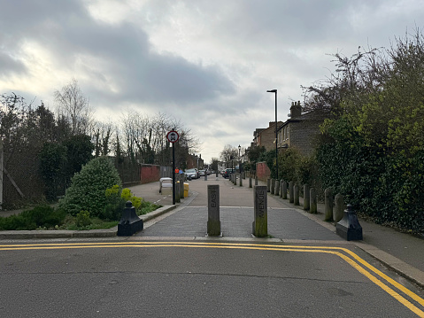 Cars restricted on a cycle path in Walthamstow, London. Part of the Mini Holland scheme. March 2024