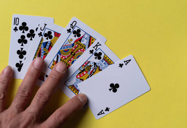 istock person with playing cards 2083169987