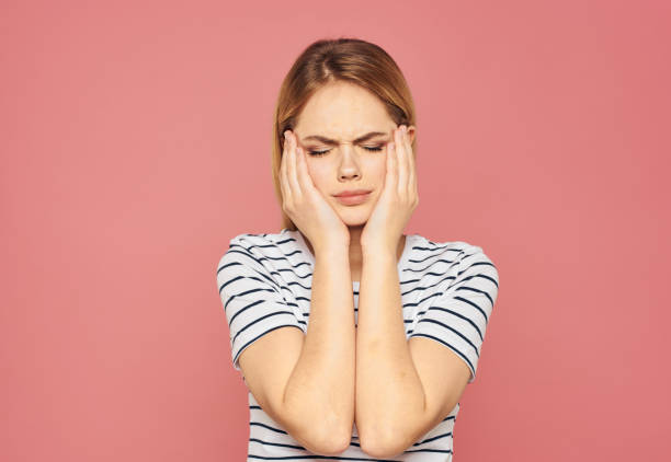 istock Beautiful blonde gesturing with her hands on a pink background model cropped view 2083236506