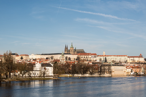 Vltava river with Mala Strana and Hradcany with Prazsky hrad castle above in Prague city in Czech republic