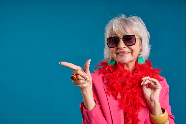 istock Stylish Senior Woman Pointing with a Smile 2083330633