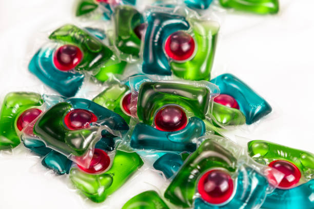 A large collection of colorful dishwashing pods displayed together. Perfect for themes of cleaning products, household chores, and home essentials.