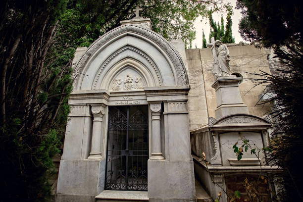 Graves in a wall at the Monumental Cemetery of Bonaria, Cagliari, Italy.