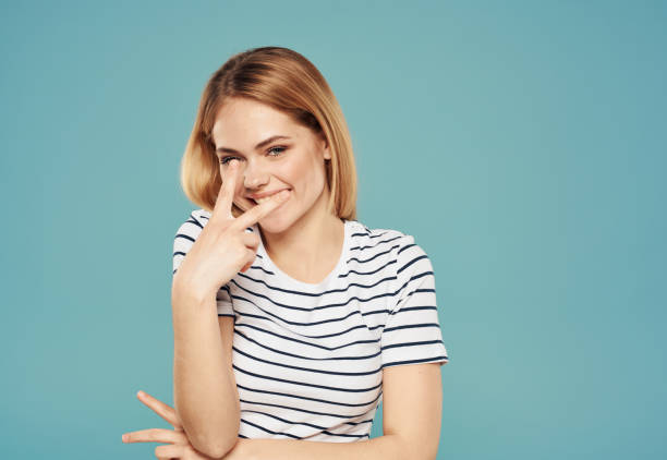 istock Energetic blonde emotion fun gesturing with hands positive gesture 2083385296