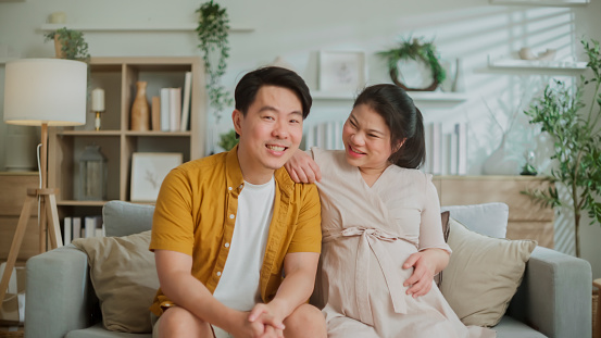 Loving Young asian Couple Spending wonderful moment together they sharing love conversation together with love and emotion Loving Young Couple Spending Morning at home