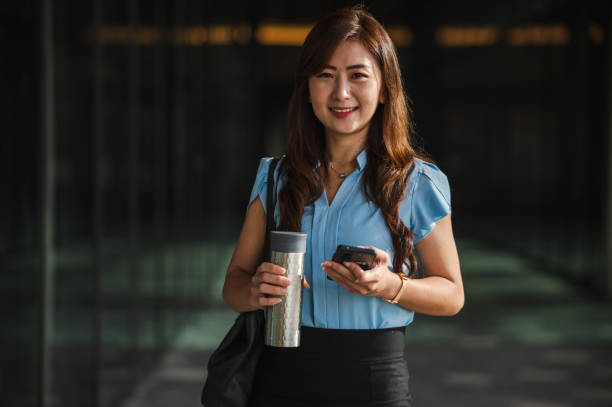 istock Modern Businesswoman: Multitasking in the Urban Landscape 2083404788