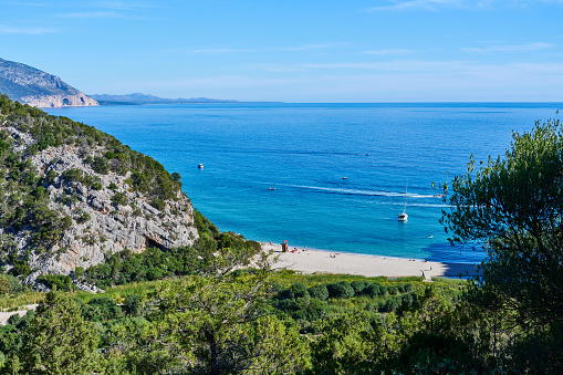 Turkish landscape with Olympos mountain, beach with green forest