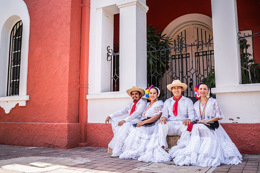 Portrait of traditional Mexican dancers outdoors