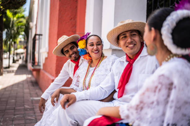 istock Traditional Mexican dancers talking outdoors 2083408508