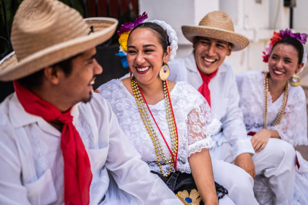 istock Traditional Mexican dancers talking outdoors 2083409029