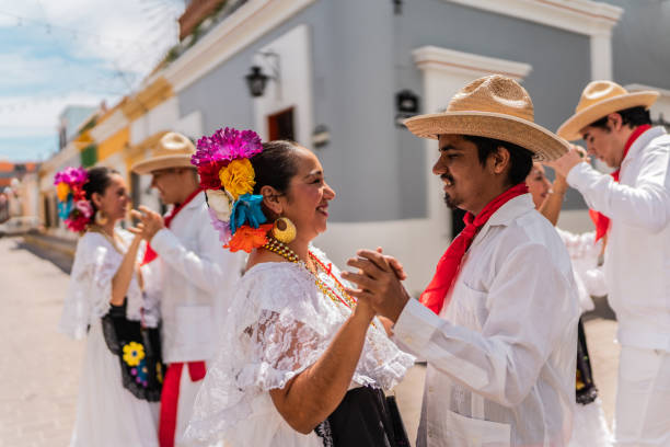 istock Young Mexican couple dancer outdoors 2083415942