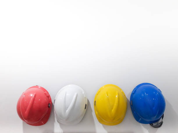 Helmets for construction workers, engineers, technicians, inspectors who work on construction sites. Safety hardhat while working to prevent accidents. work equipment of Blue collar