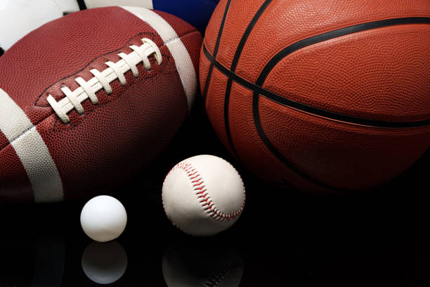 istock Various sports equipment on black background studio shot 2083450959