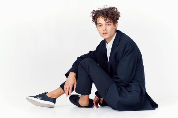 istock man in suit modern style self confidence fashion studio light background 2083453076